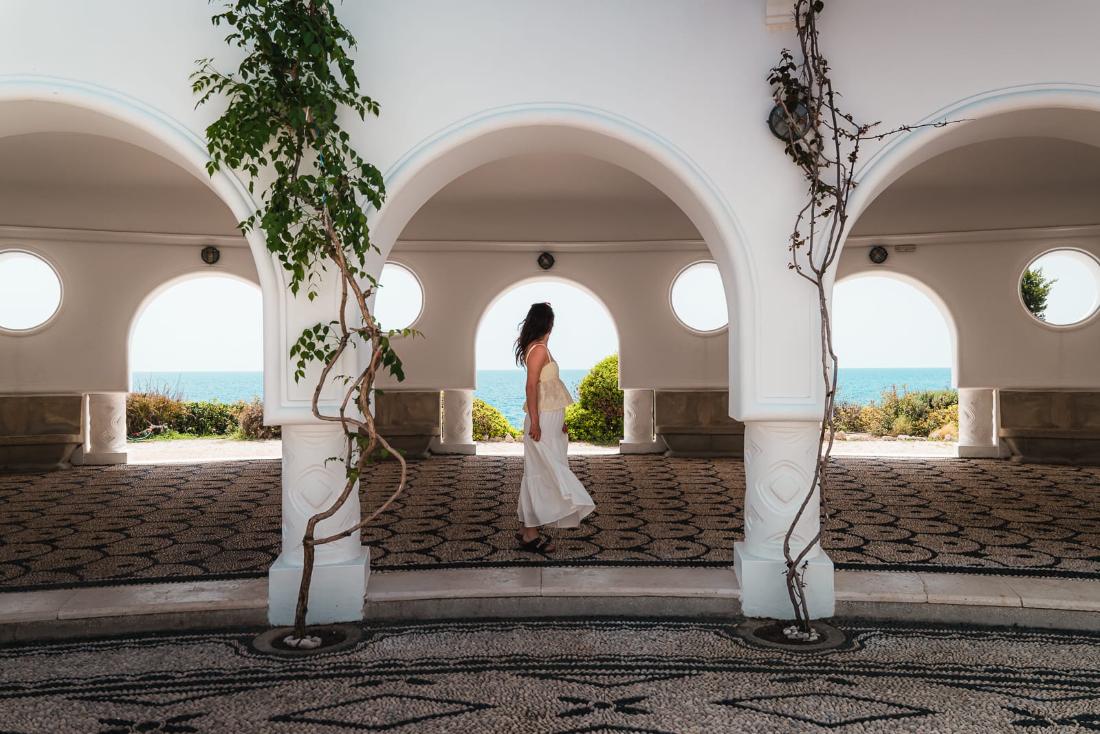 woman standing under archway at Kalithea Springs 