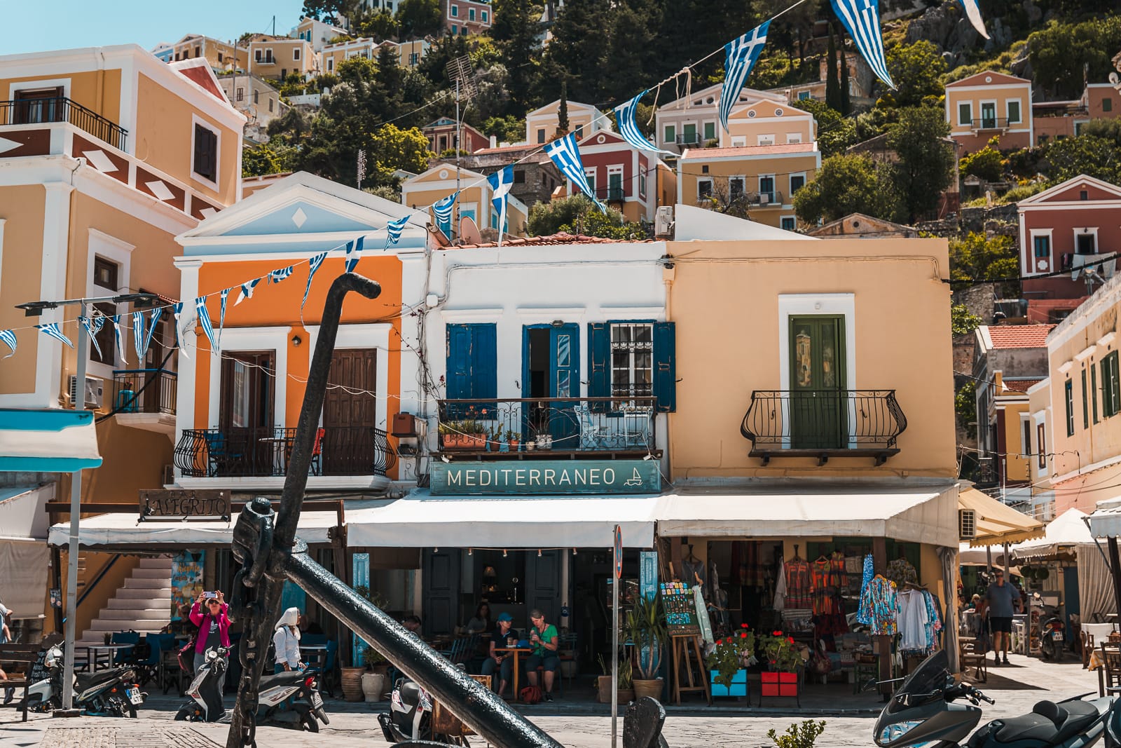 colourful shop fronts in symi island, greece