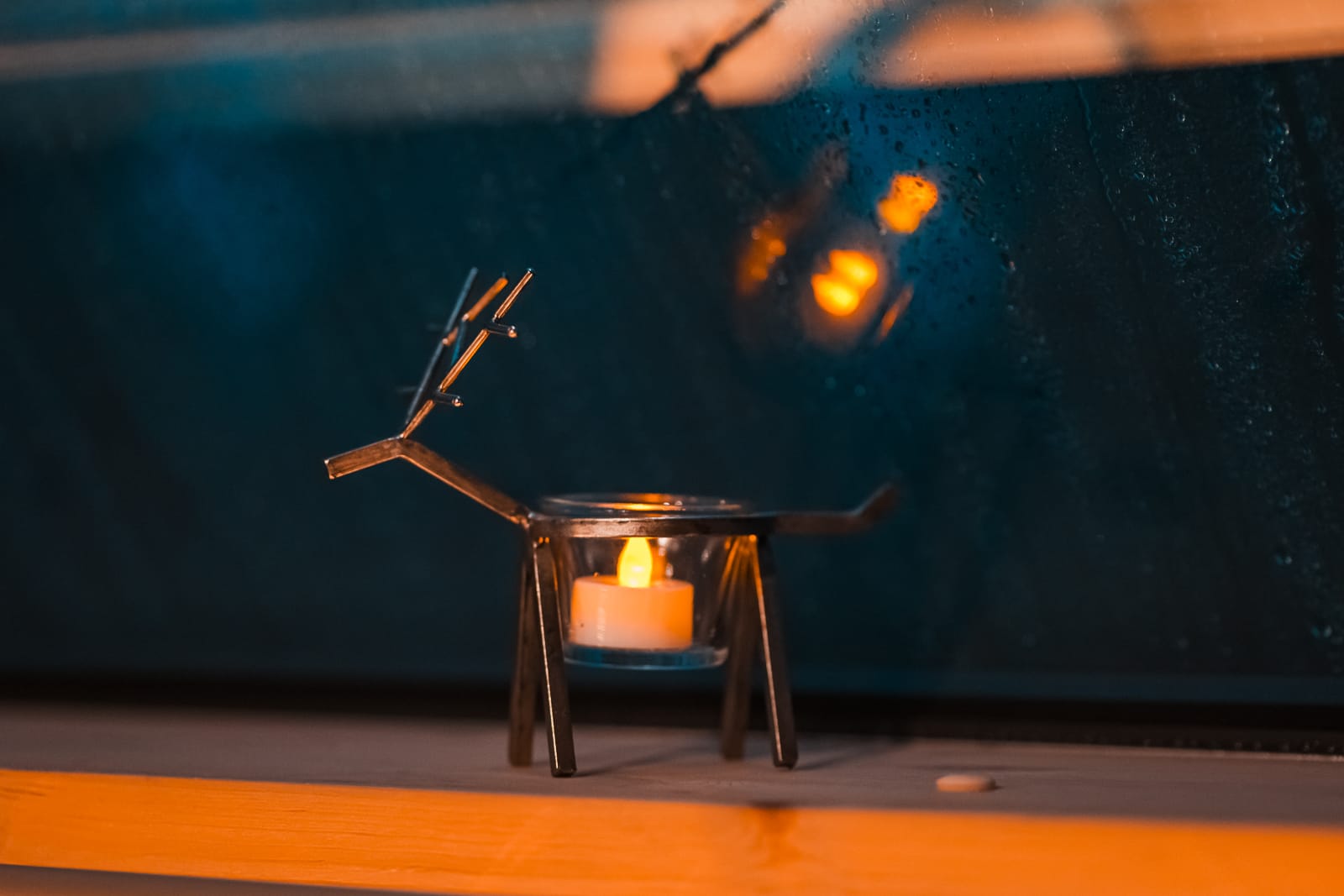 reindeer candle holder with candle in at syote igloo