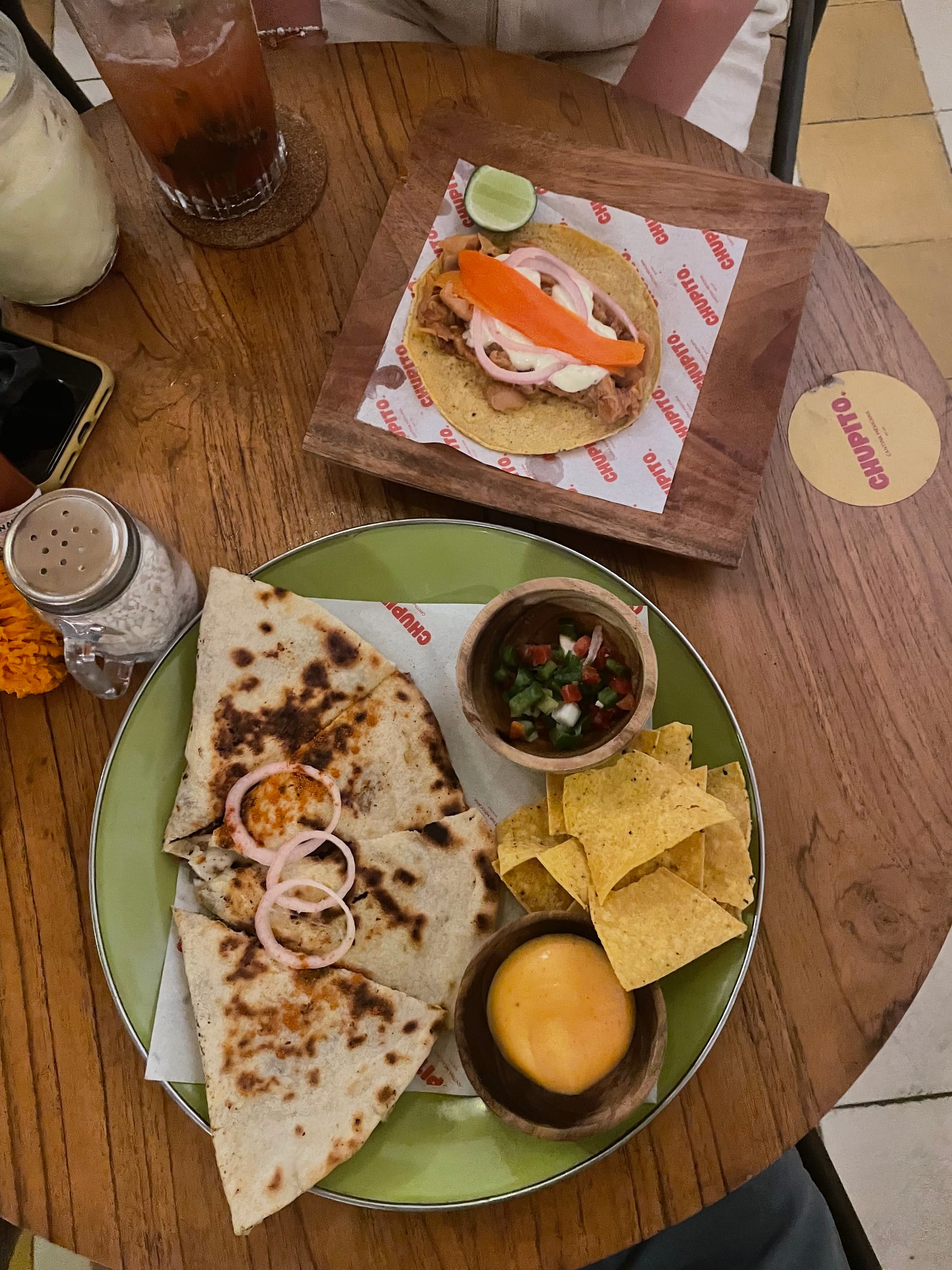 tacos and quesadillas on a table at Chupito mexican gili air