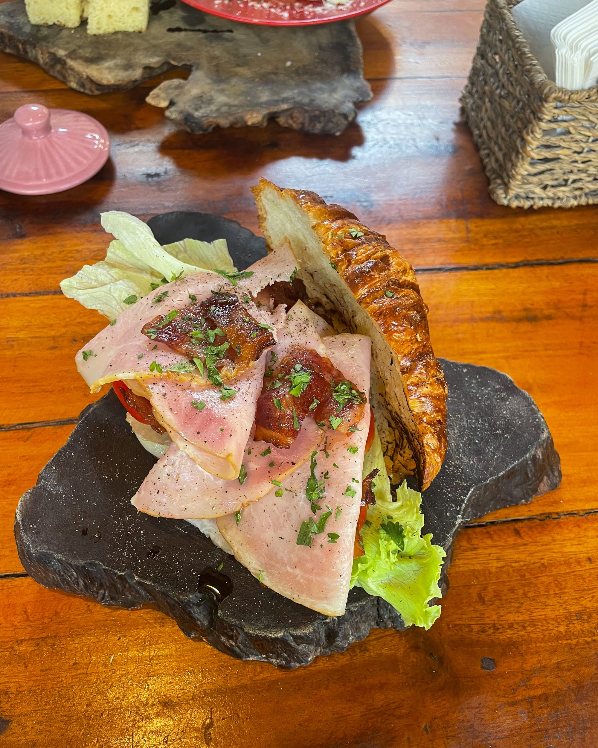 savory croissant with ham and lettuce at ITALY Pizza & Cucina