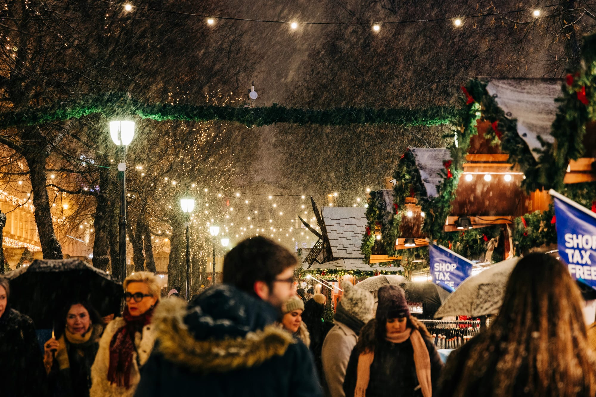 snowing at a christmas market