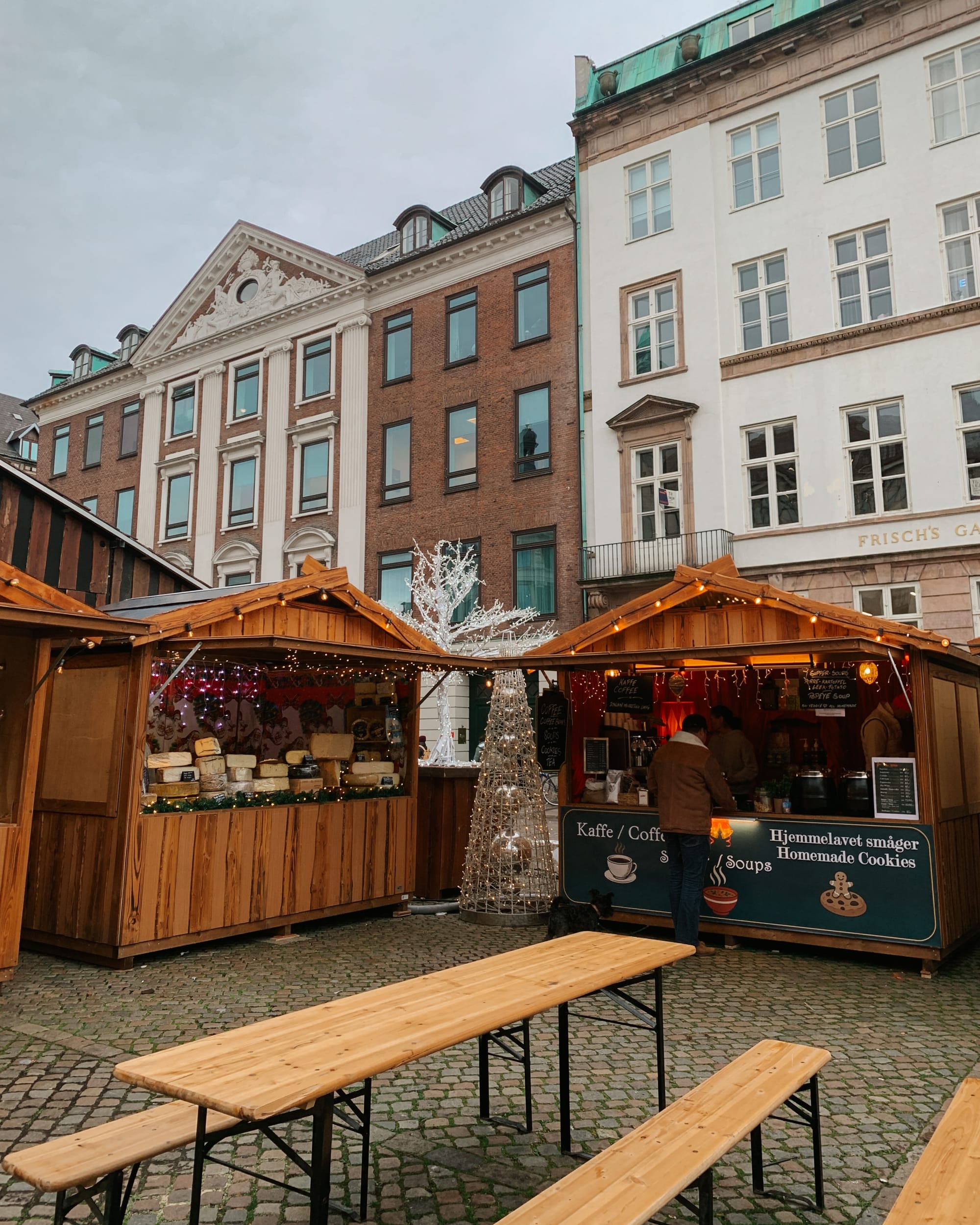 christmas market stalls infront of buildings in copenhagen