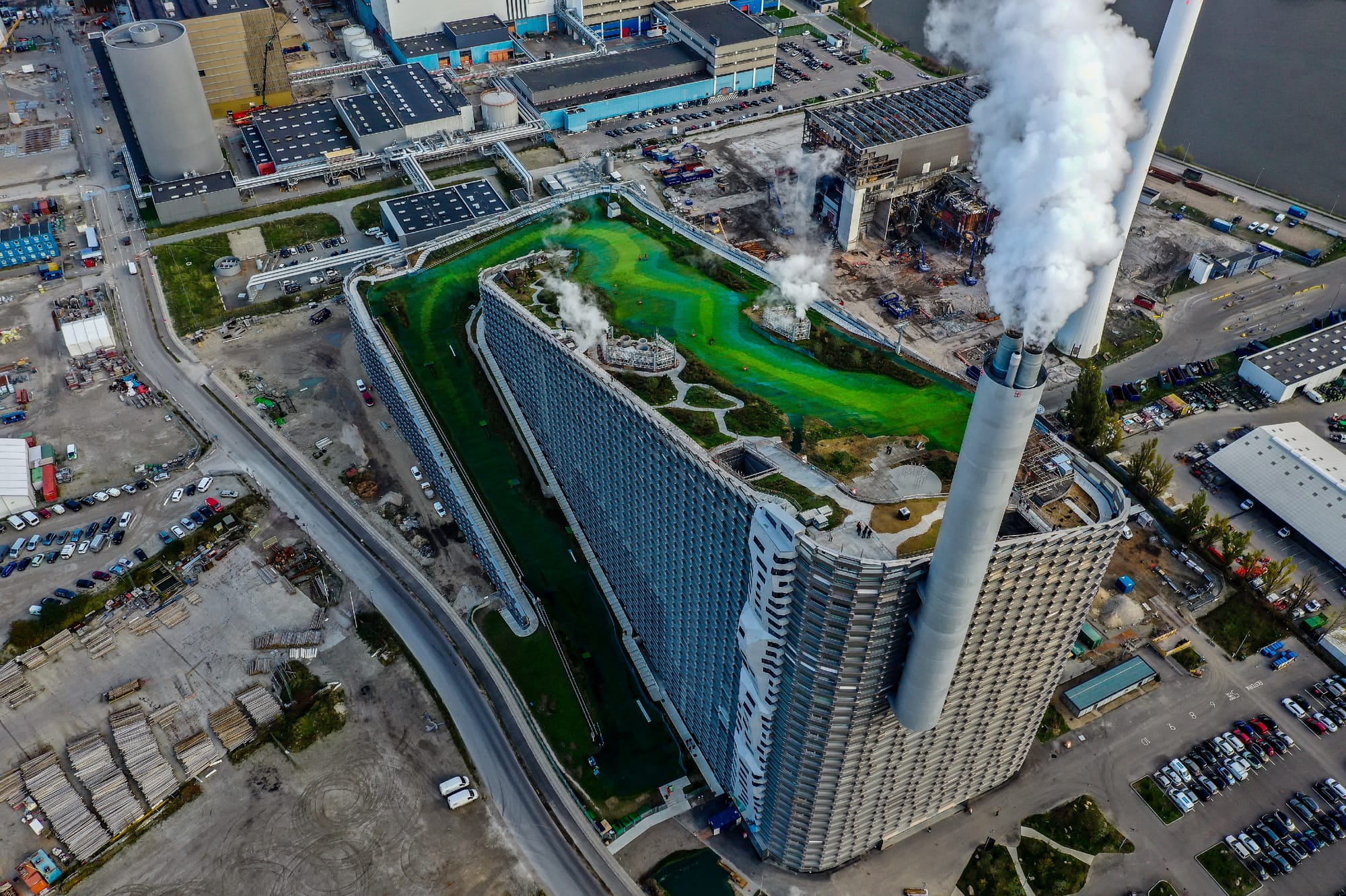 aerial view of industrial building with green slope on the roof, Copenhill