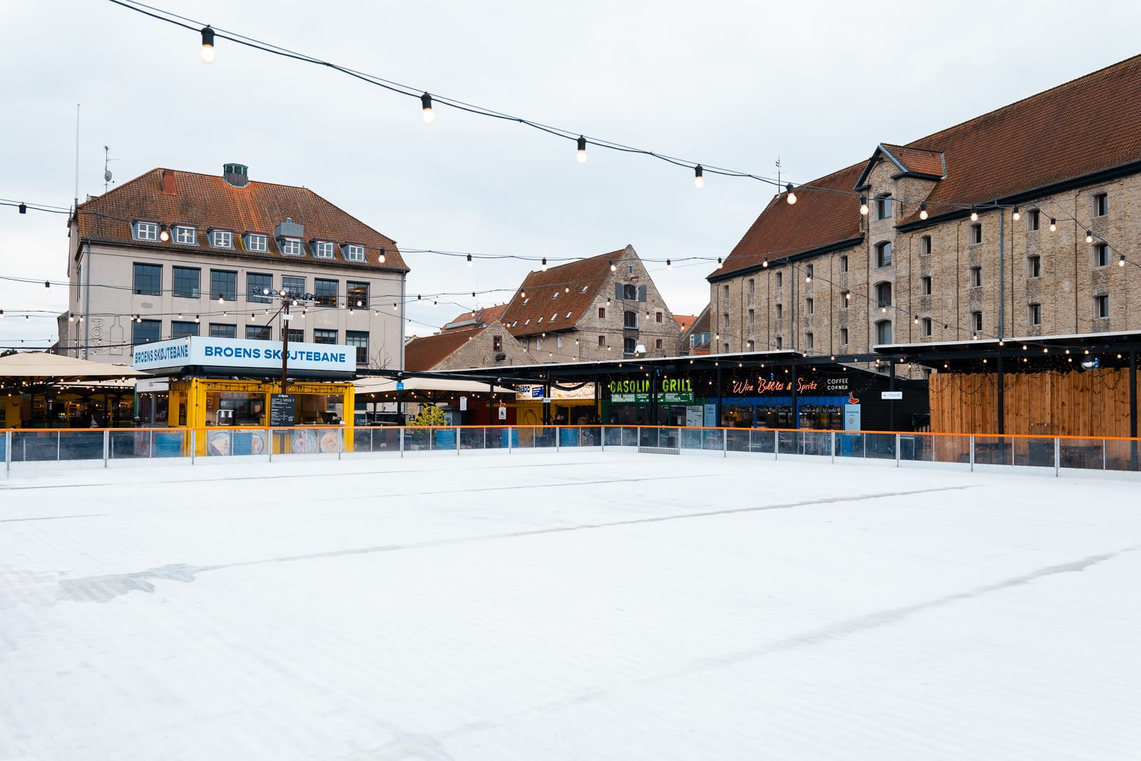 Broens Skøjtebane ice rink surrounded by buildings in copenhagen