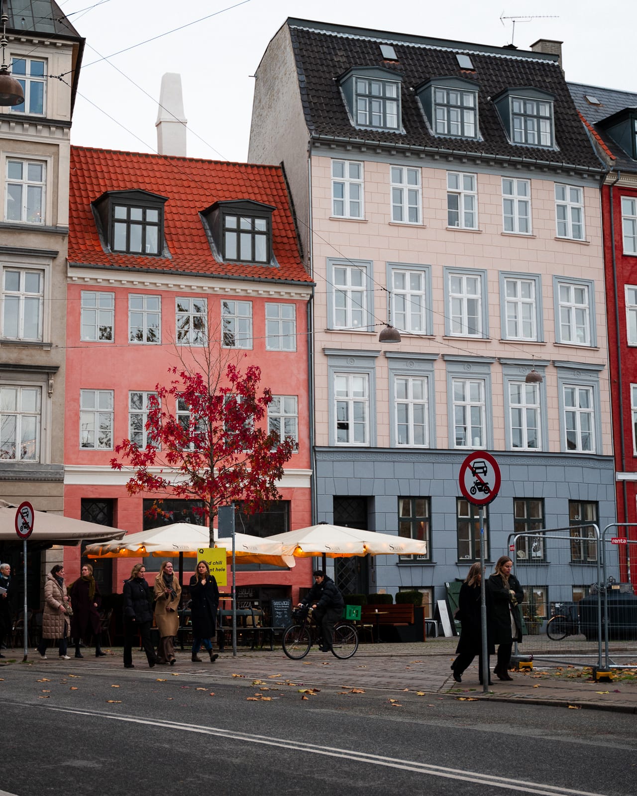pink, beige and blue houses in copenhagen