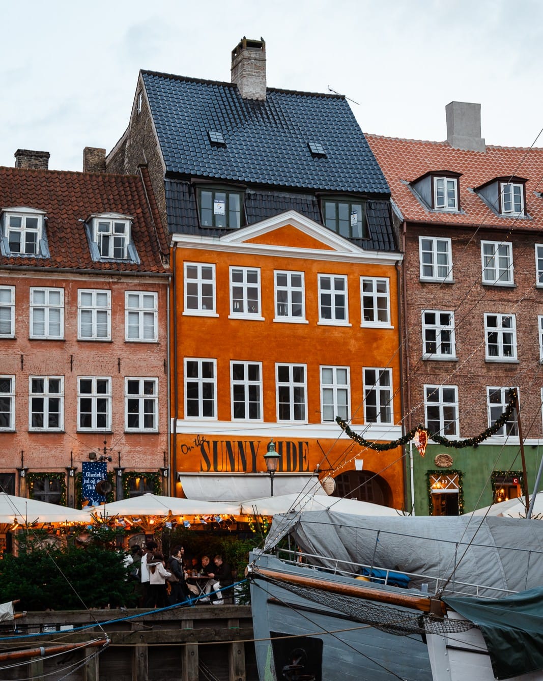 orange and green houses in copenhagen